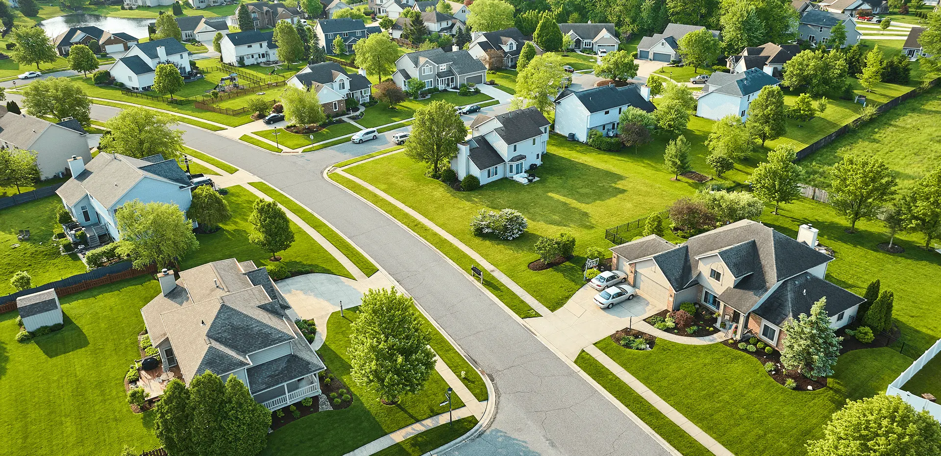 Aerial view of suburban neighborhood with houses.